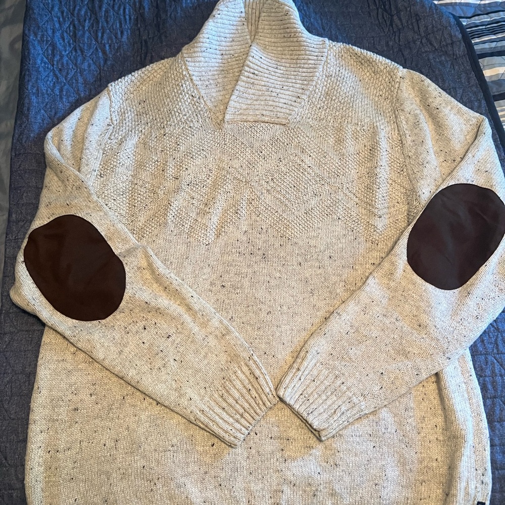 Men’s cotton sweater with leather elbow pads.